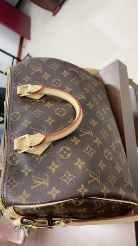 Click to view full screen Louis Vuitton Speedy Bandouliere 30 M41112 photo review